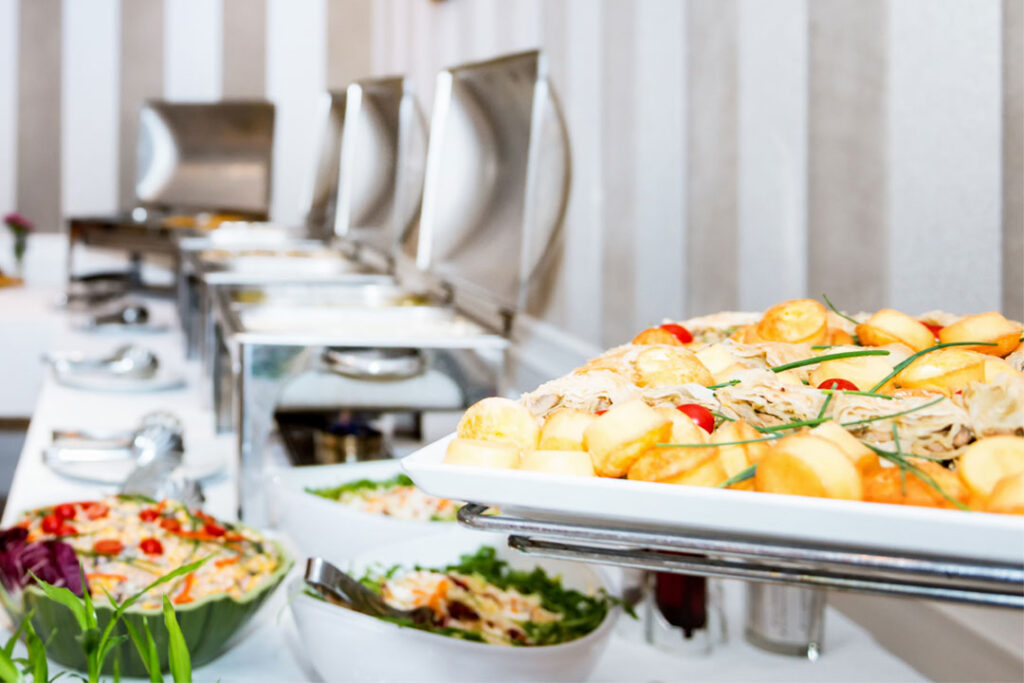 Catering table with food at event
